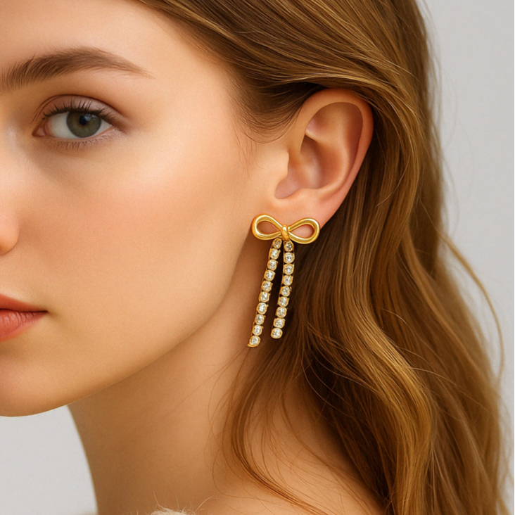 Örhängen med glittrig rosett